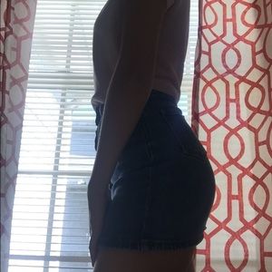 Dark blue high waited button down skirt.